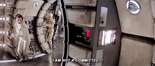 Animated gif of Princess Leia Organa running down a hallway in the Millennium Falcon, yelling "I am not a committee!"